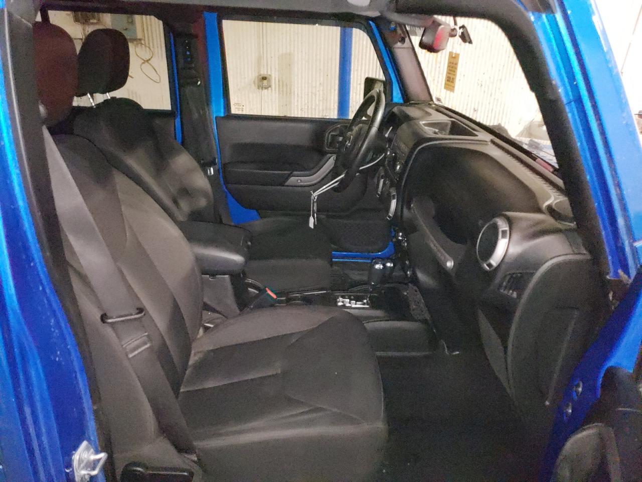 Photo 5 from auction – 2015 JEEP WRANGLER U with VIN 1C4BJWDG4FL759502