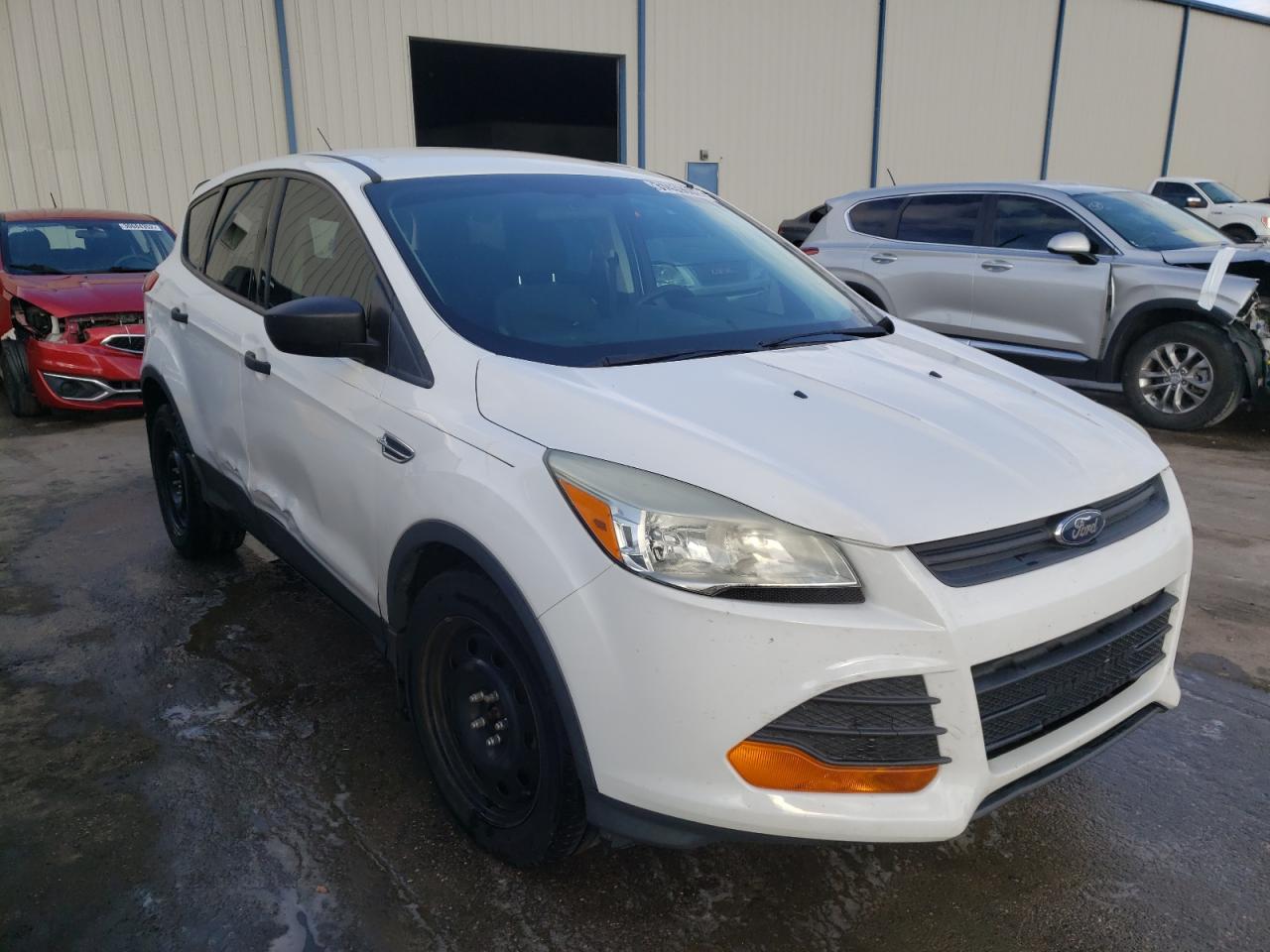FORD ESCAPE S 2014 with VIN 1FMCU0F77EUB92857 - Photo from auction