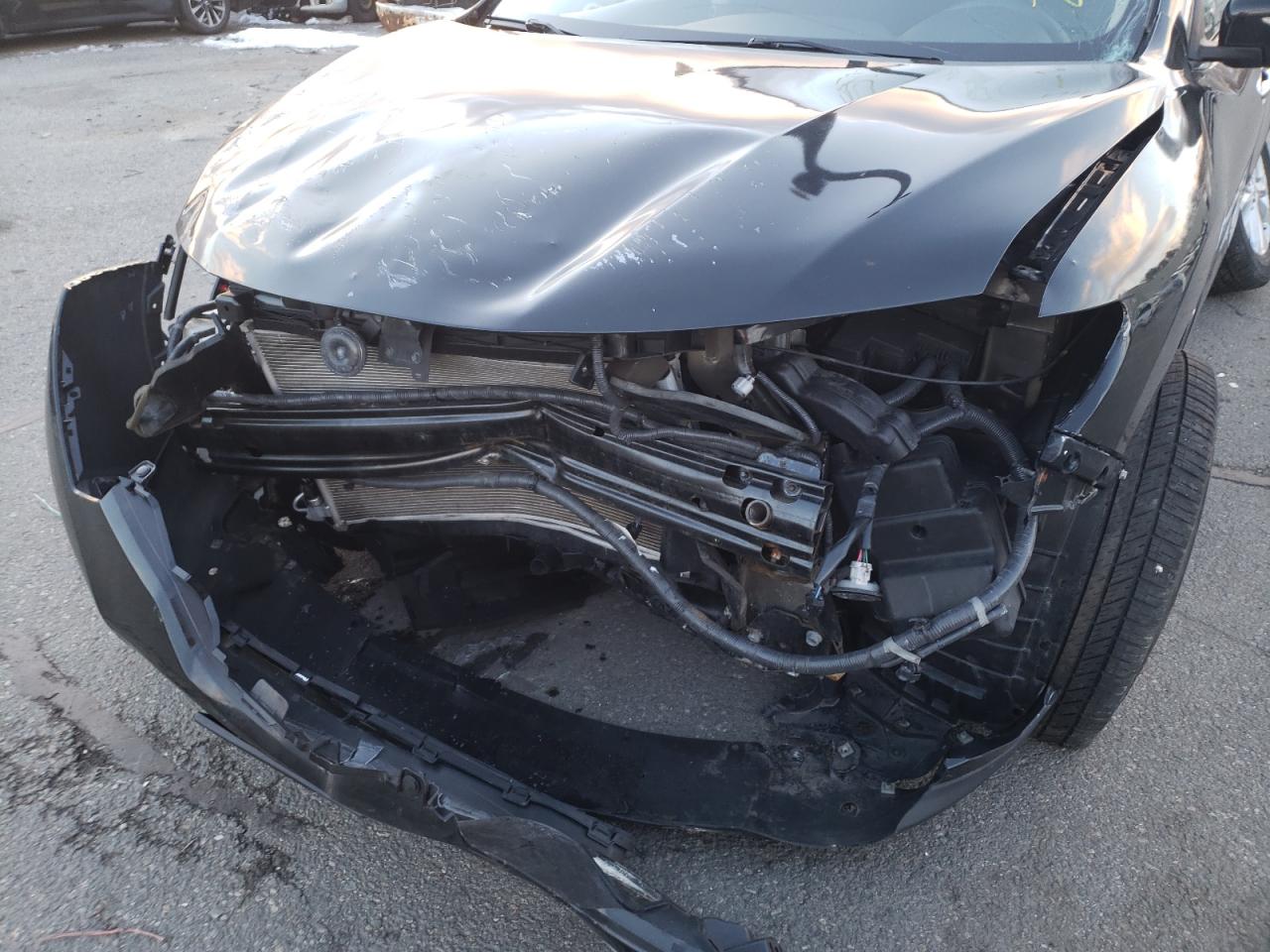 Photo 9 from auction – 2015 NISSAN ROGUE S with VIN 5N1AT2MV8FC812663