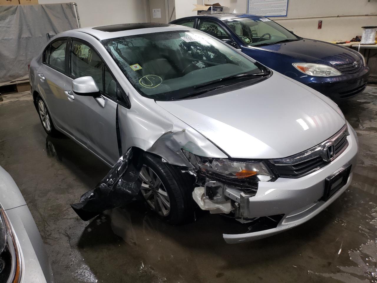 HONDA CIVIC 2012 with VIN 19XFB2F94CE053818 - Photo from auction
