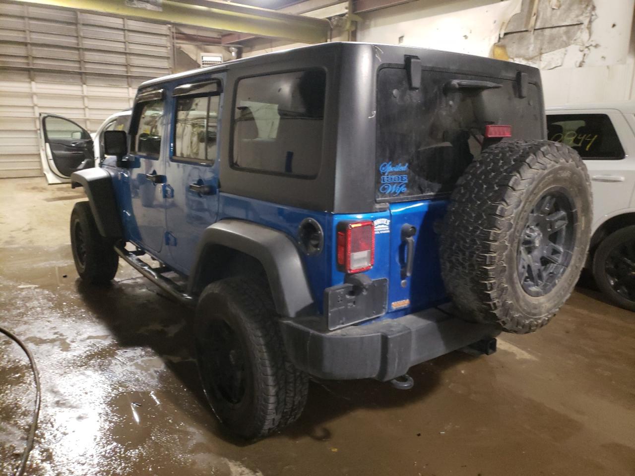 Photo 3 from auction – 2015 JEEP WRANGLER U with VIN 1C4BJWDG4FL759502