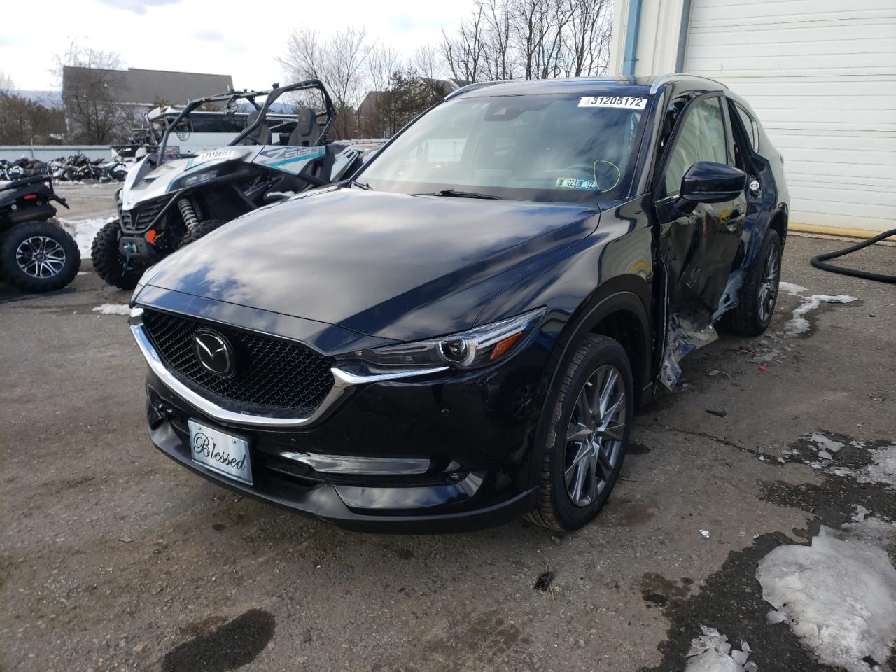 Photo 2 from auction – 2019 MAZDA CX-5 SIGNA with VIN JM3KFBEY1K0566227