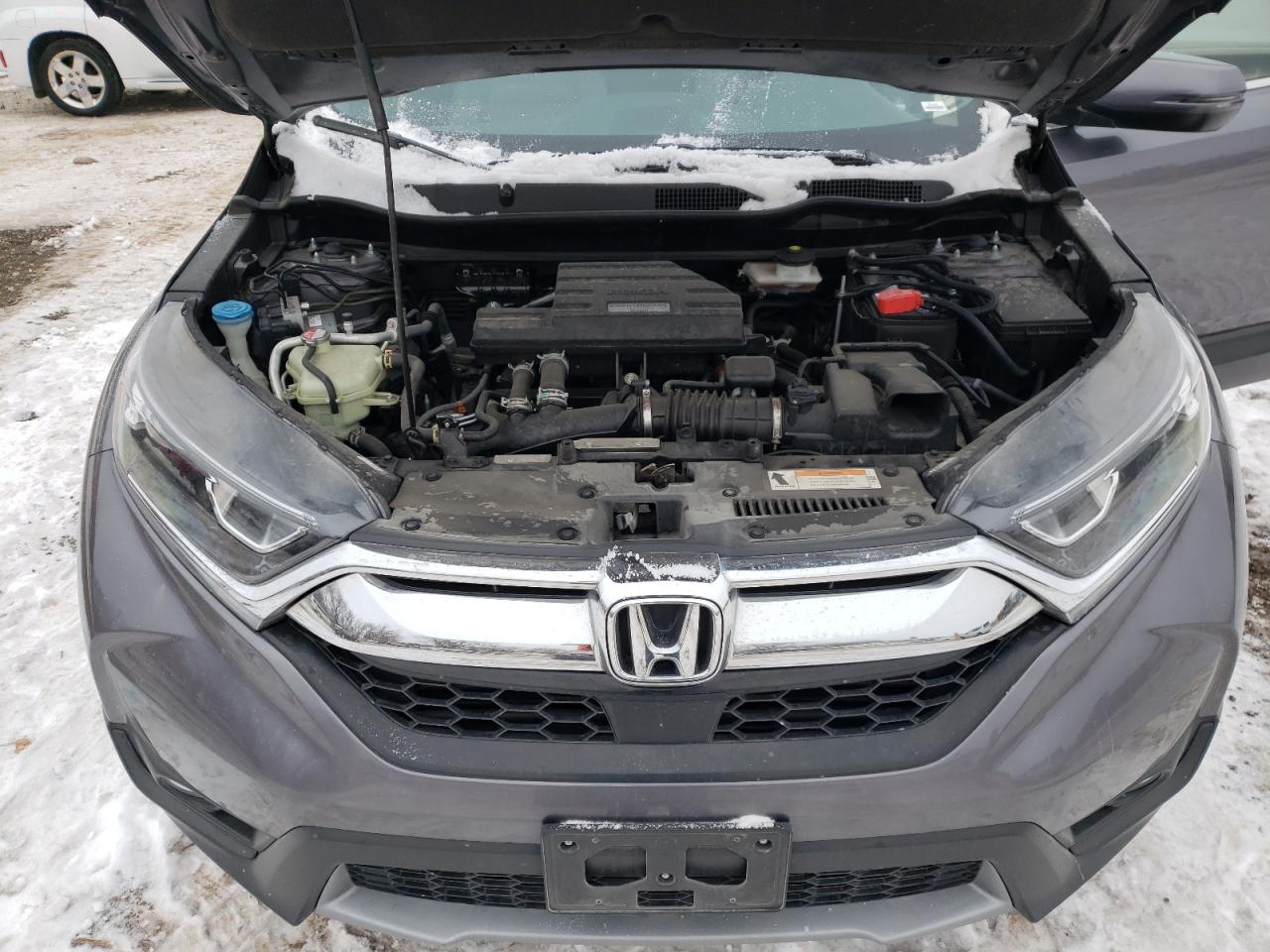 Photo 7 from auction – 2018 HONDA CR-V EX with VIN 7FARW2H56JE074855