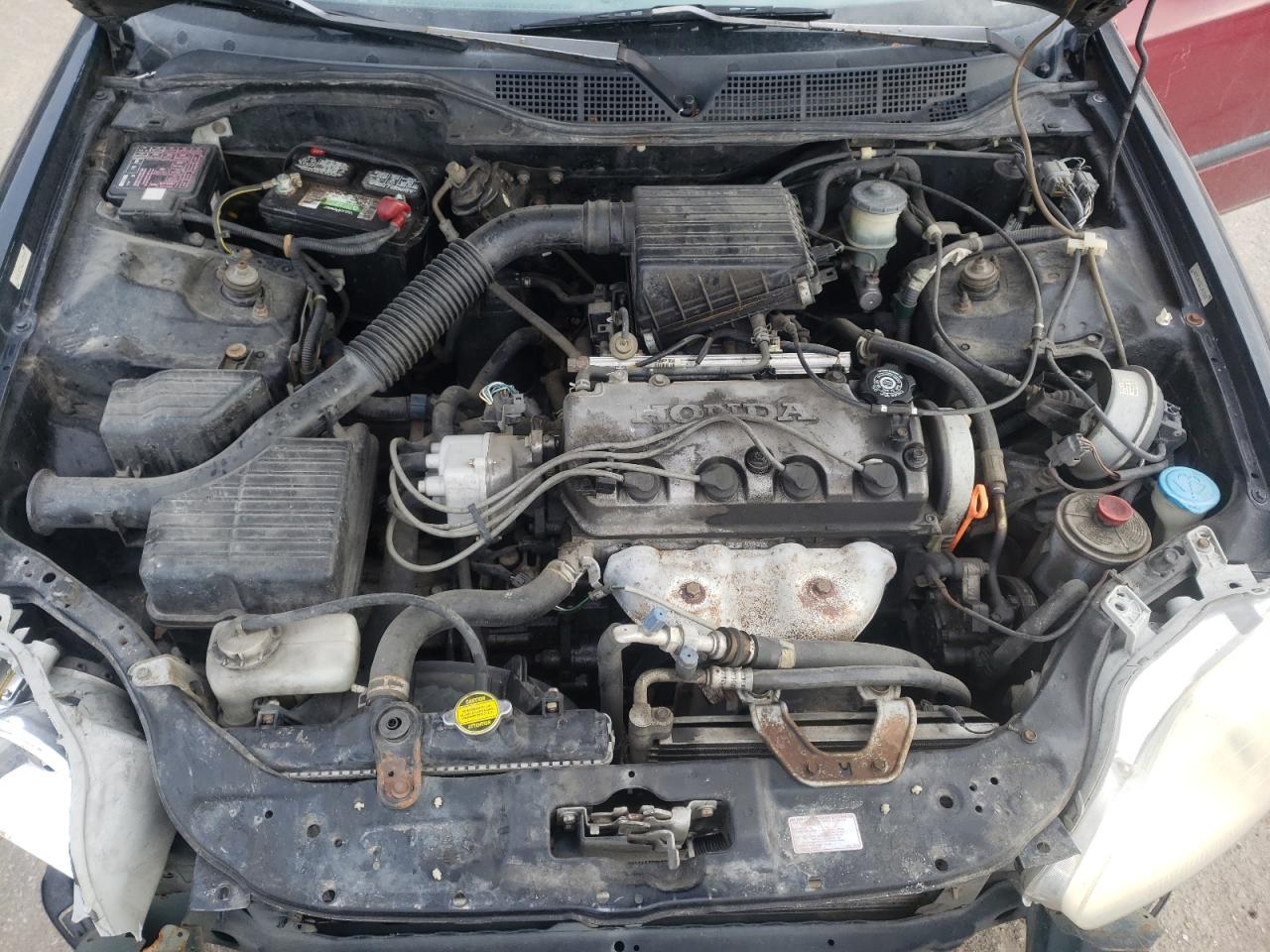 Photo 7 from auction – 1998 HONDA CIVIC with VIN 1HGEJ6671WL053373