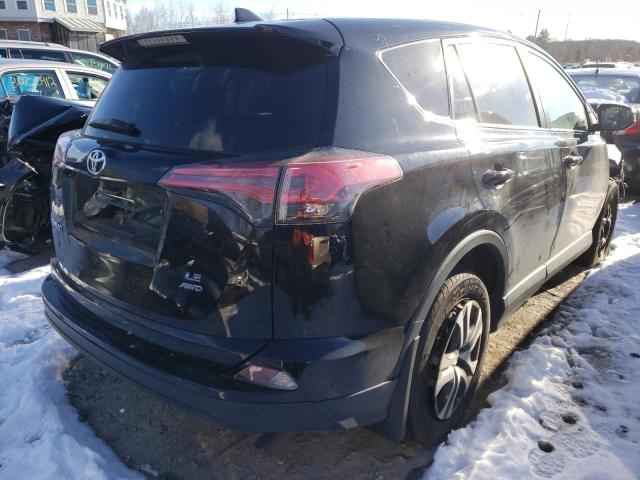 Photo 4 from auction – 2018 TOYOTA RAV4 LE with VIN 2T3BFREV7JW768328