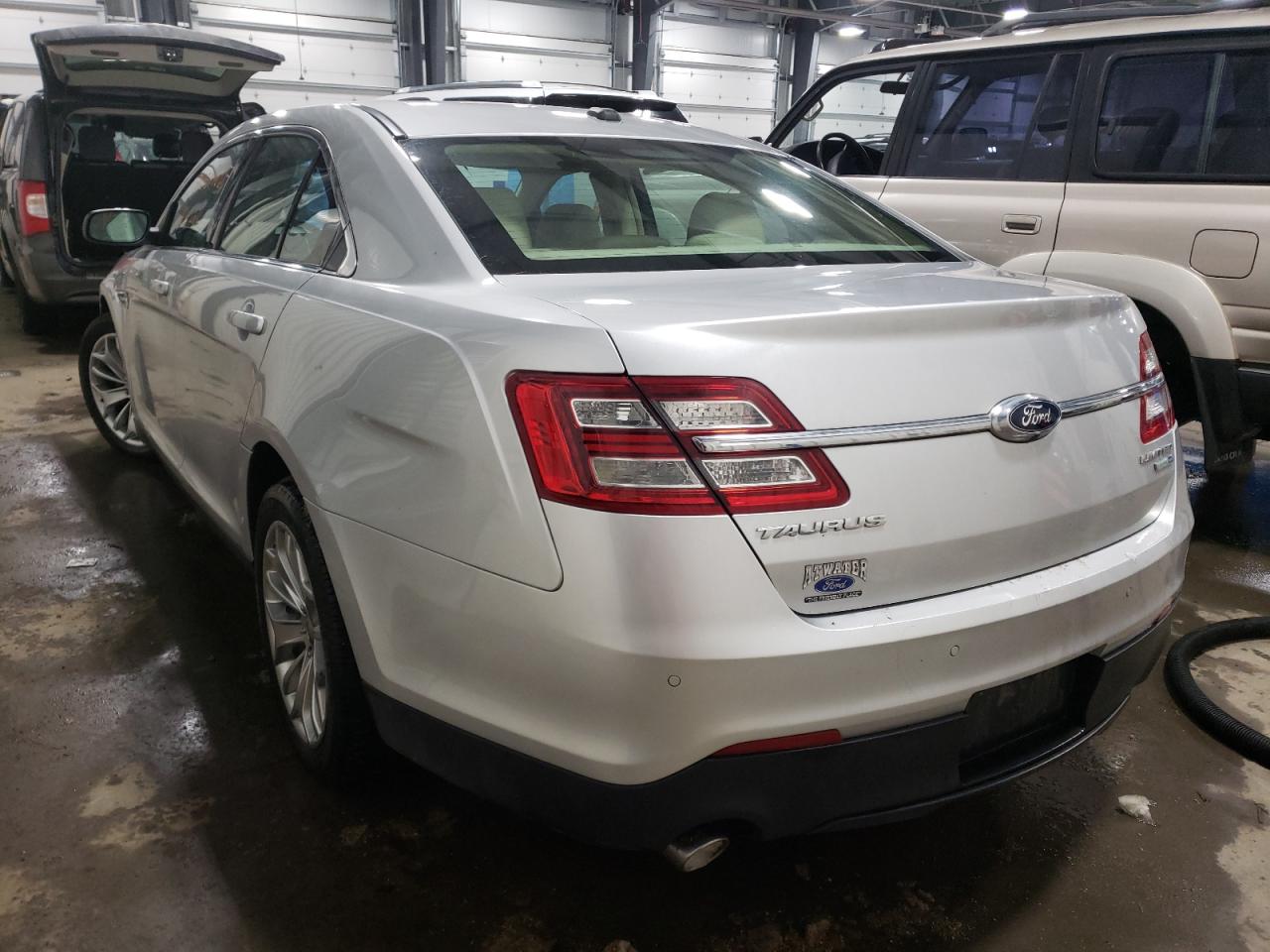 Photo 3 from auction – 2013 FORD TAURUS LIM with VIN 1FAHP2J82DG181037