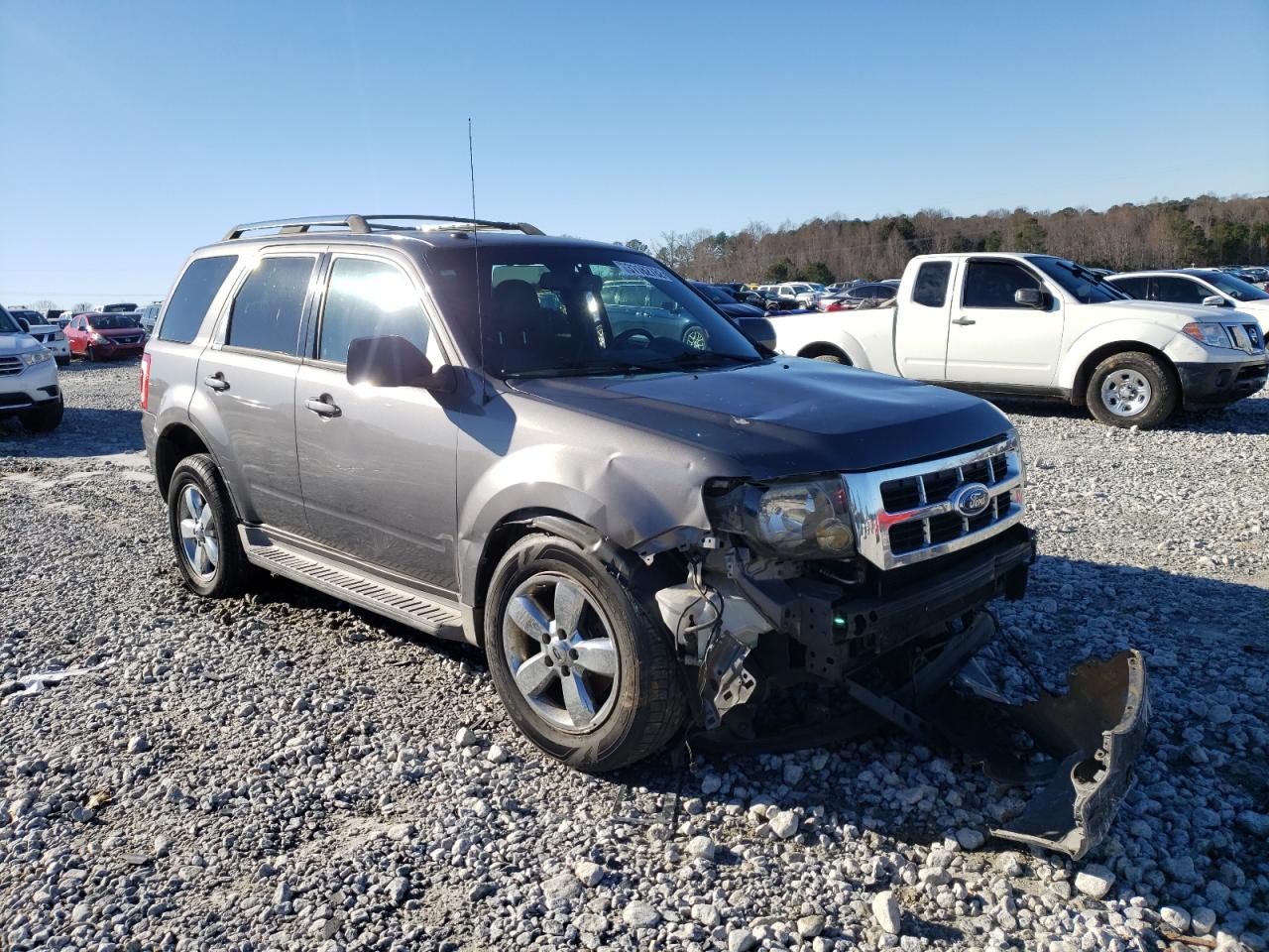 FORD ESCAPE LIM 2011 with VIN 1FMCU9E73BKB38730 - Photo from auction