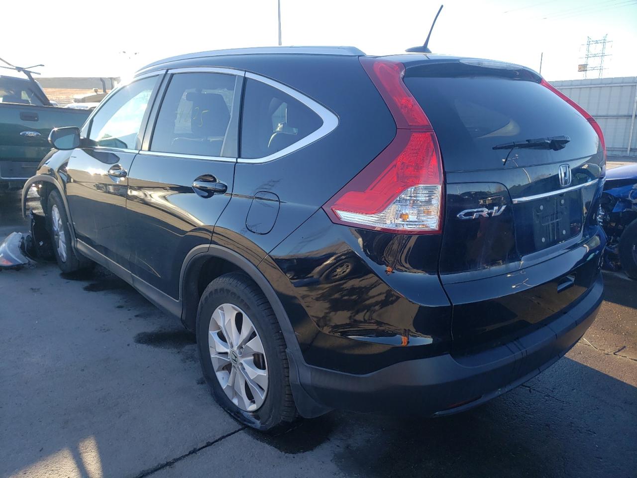 Photo 3 from auction – 2014 HONDA CR-V EXL with VIN 2HKRM4H70EH690069