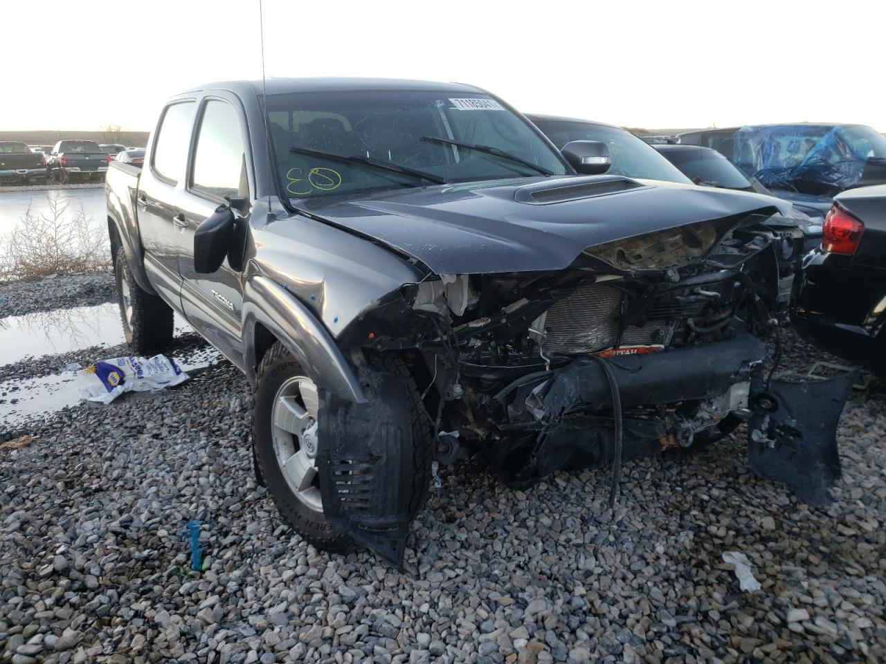 Photo 9 from auction – 2014 TOYOTA TACOMA DOU with VIN 3TMLU4EN5EM163745
