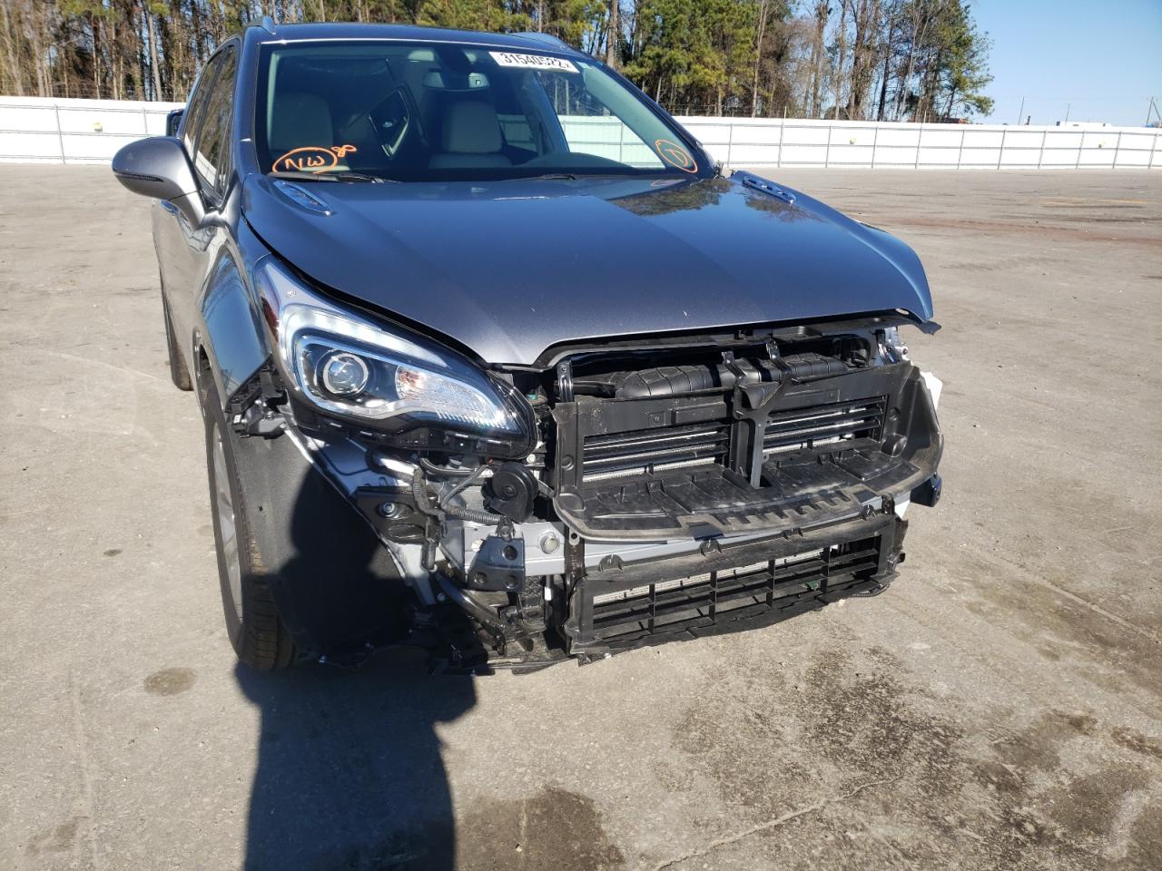 Photo 9 from auction – 2020 BUICK ENVISION E with VIN LRBFXCSA7LD229459