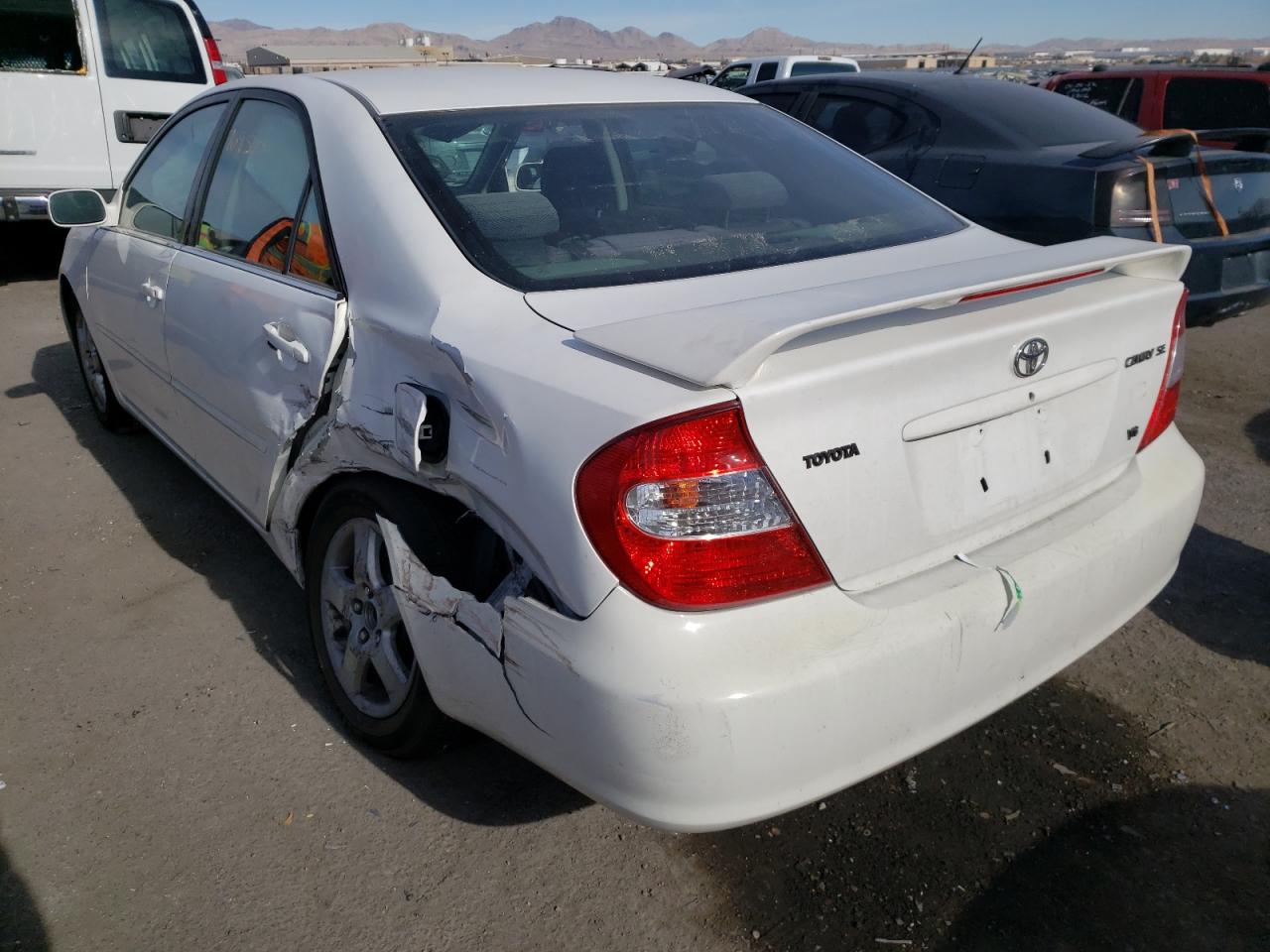 Photo 3 from auction – 2002 TOYOTA CAMRY LE with VIN JTDBF30K420035914