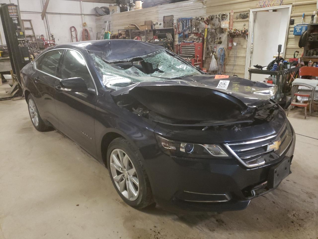 CHEVROLET IMPALA LT 2016 with VIN 2G1115S3XG9190176 - Photo from auction