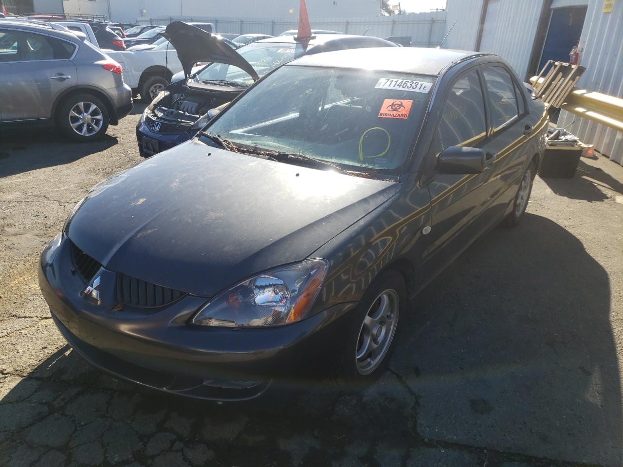Photo 2 from auction – 2004 MITSUBISHI LANCER OZ with VIN JA3AJ86E84U036034