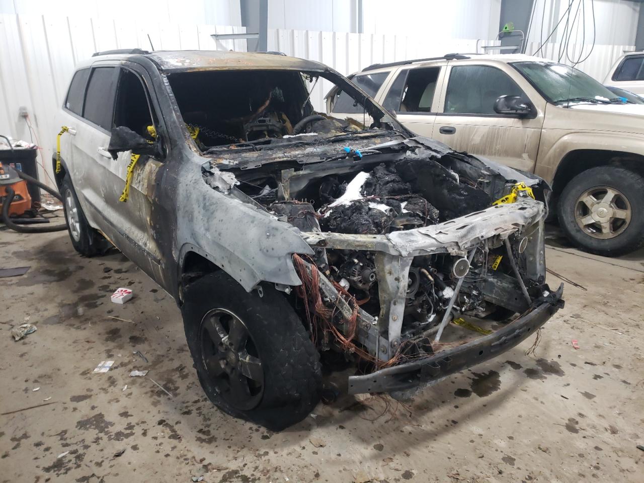 JEEP GRAND CHER 2011 with VIN 1J4RR4GG4BC551129 - Photo from auction