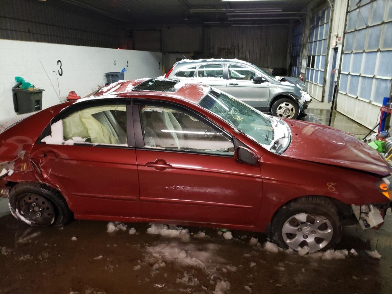 Photo 9 from auction – 2009 KIA SPECTRA EX with VIN KNAFE222195639121