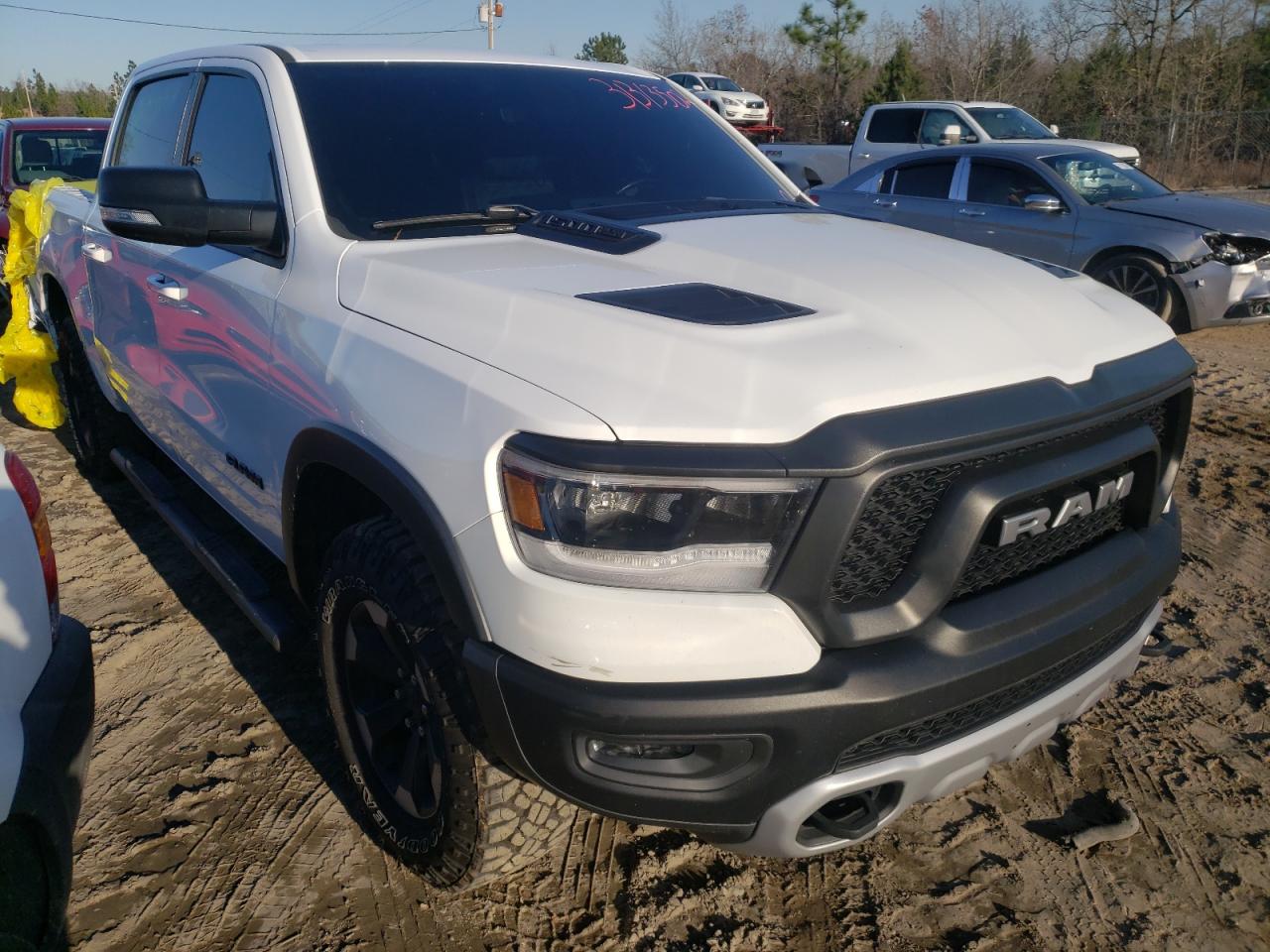RAM 1500 REBEL 2019 with VIN 1C6RRELTXKN828215 - Photo from auction