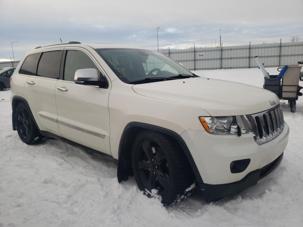 JEEP GRAND CHER 2011 with VIN 1J4RR6GT5BC536194 - Photo from auction