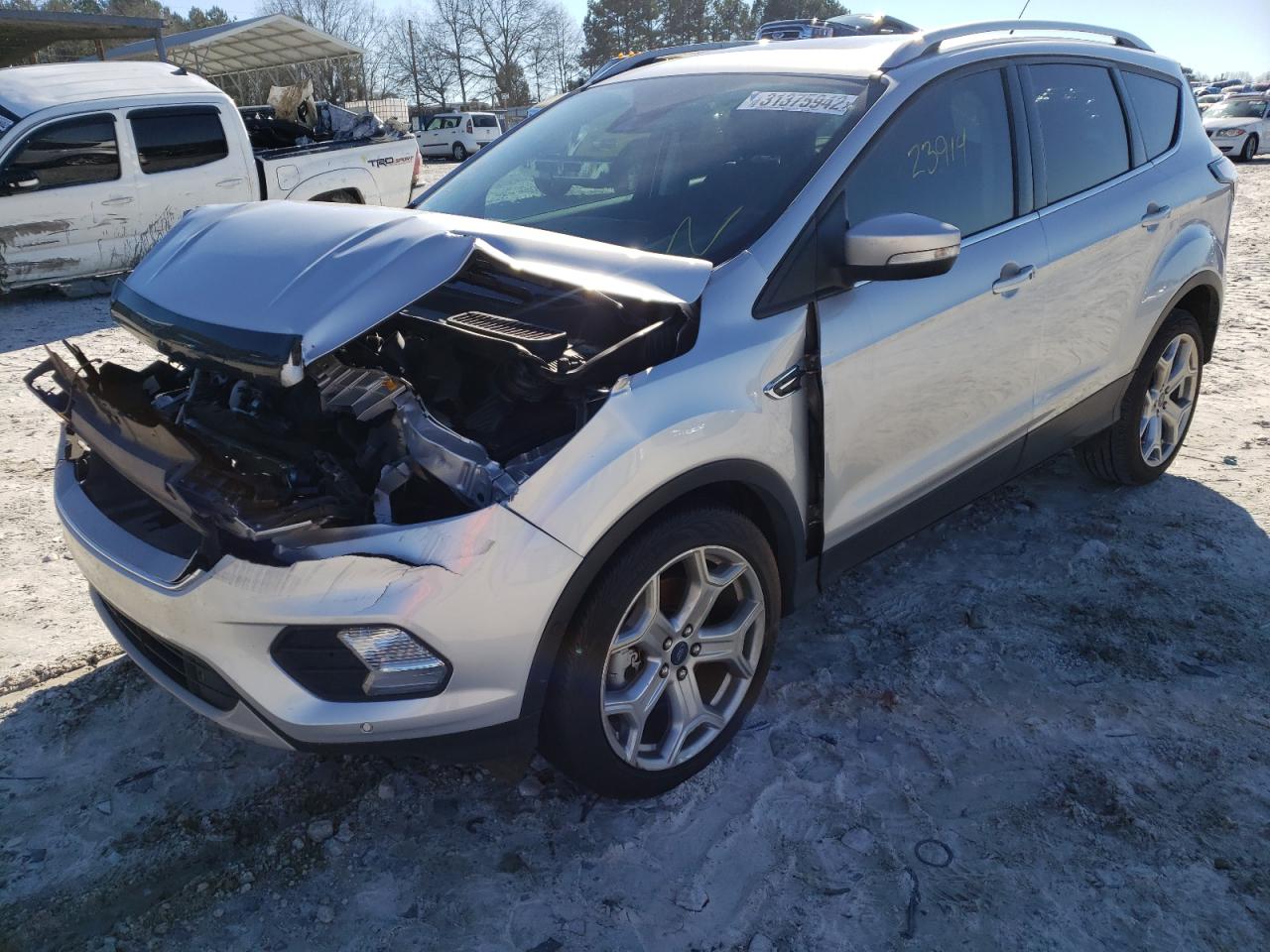Photo 2 from auction – 2017 FORD ESCAPE TIT with VIN 1FMCU0J91HUD04078