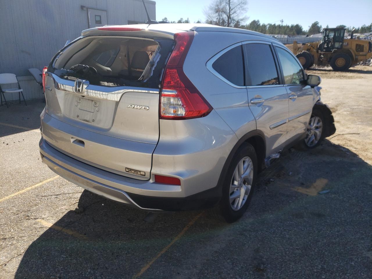 Photo 4 from auction – 2016 HONDA CR-V EXL with VIN 5J6RM4H71GL027943