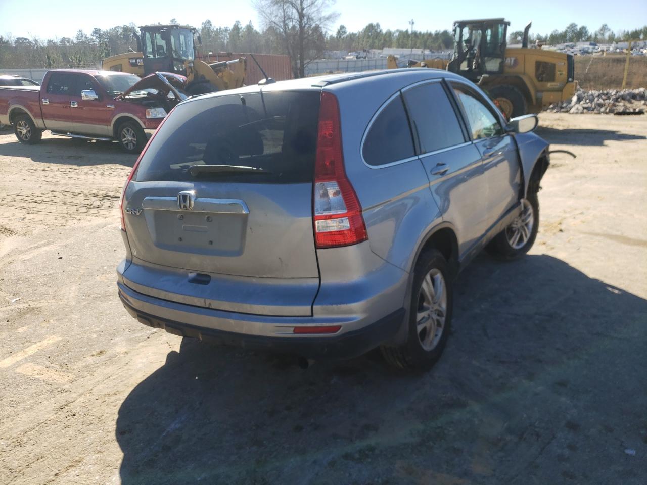 Photo 4 from auction – 2011 HONDA CR-V EXL with VIN 5J6RE3H78BL008581