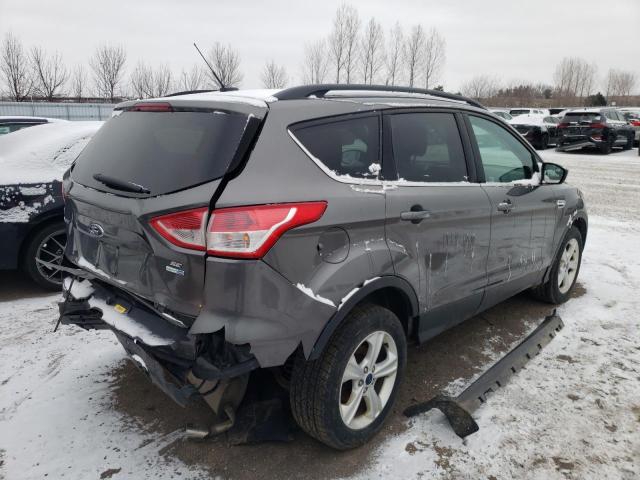 Photo 4 from auction – 2014 FORD ESCAPE SE with VIN 1FMCU9G9XEUB87317