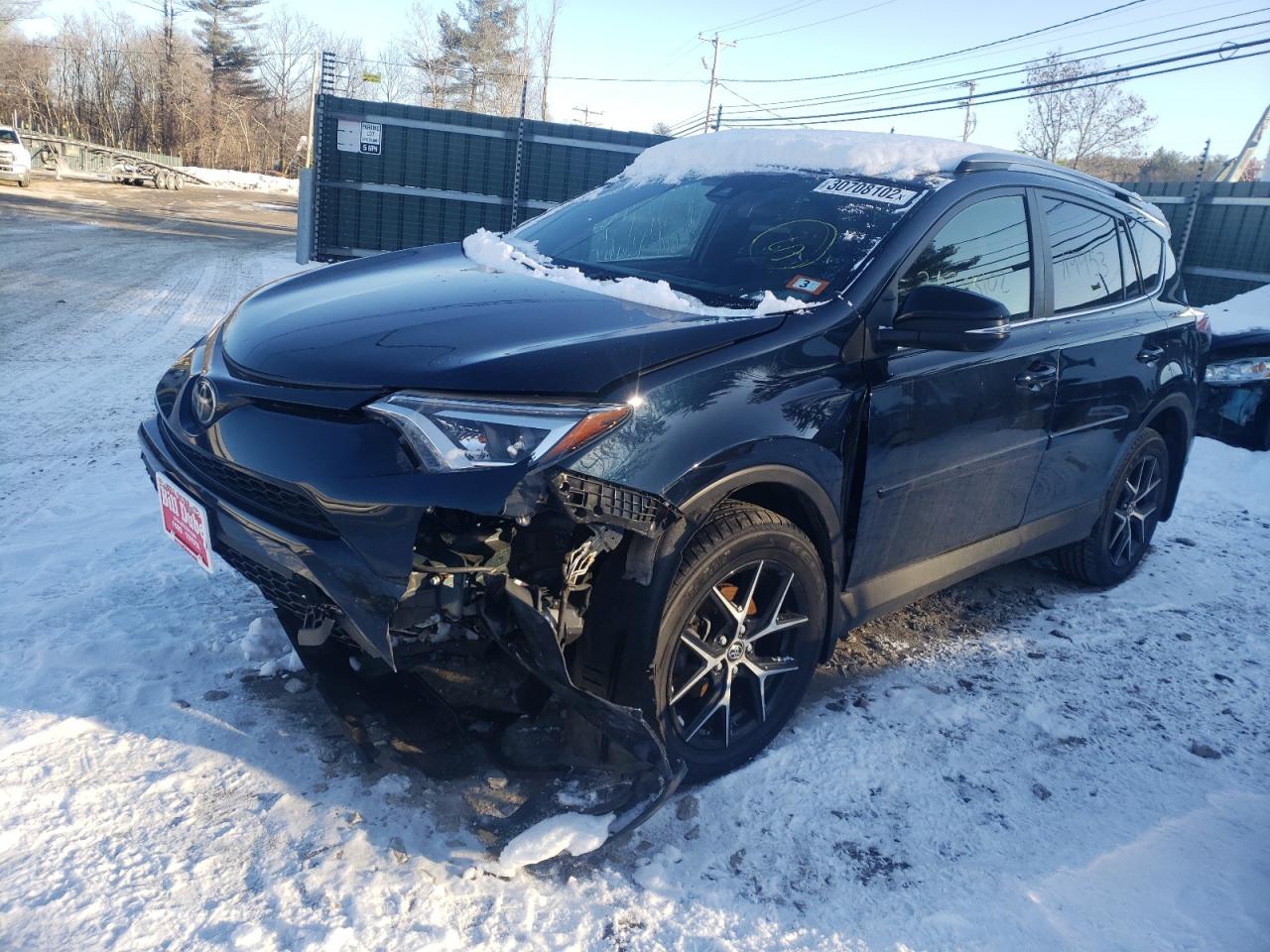 Photo 2 from auction – 2017 TOYOTA RAV4 SE with VIN JTMJFREV7HJ141343