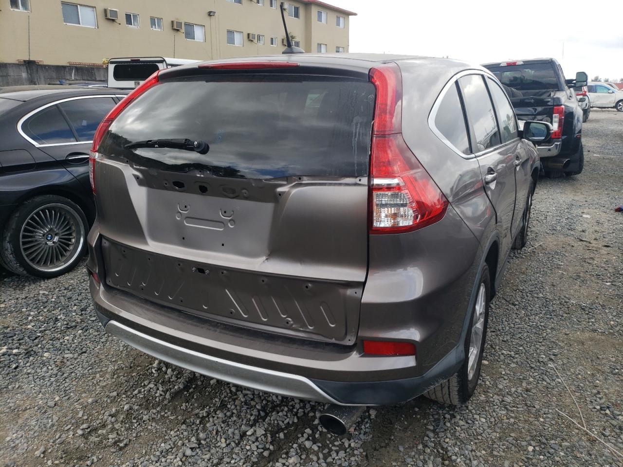 Photo 4 from auction – 2015 HONDA CR-V TOURI with VIN 5J6RM3H97FL020487