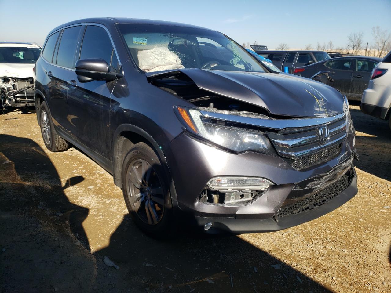 HONDA PILOT EXL 2017 with VIN 5FNYF6H5XHB037932 - Photo from auction