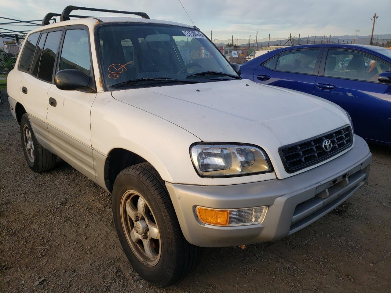 TOYOTA RAV4 1998 with VIN JT3GP10V6W0026143 - Photo from auction