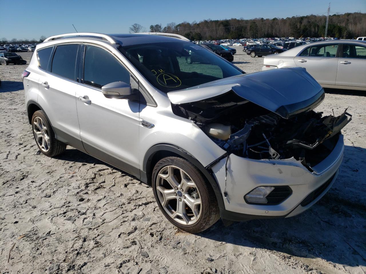 FORD ESCAPE TIT 2017 with VIN 1FMCU0J91HUD04078 - Photo from auction