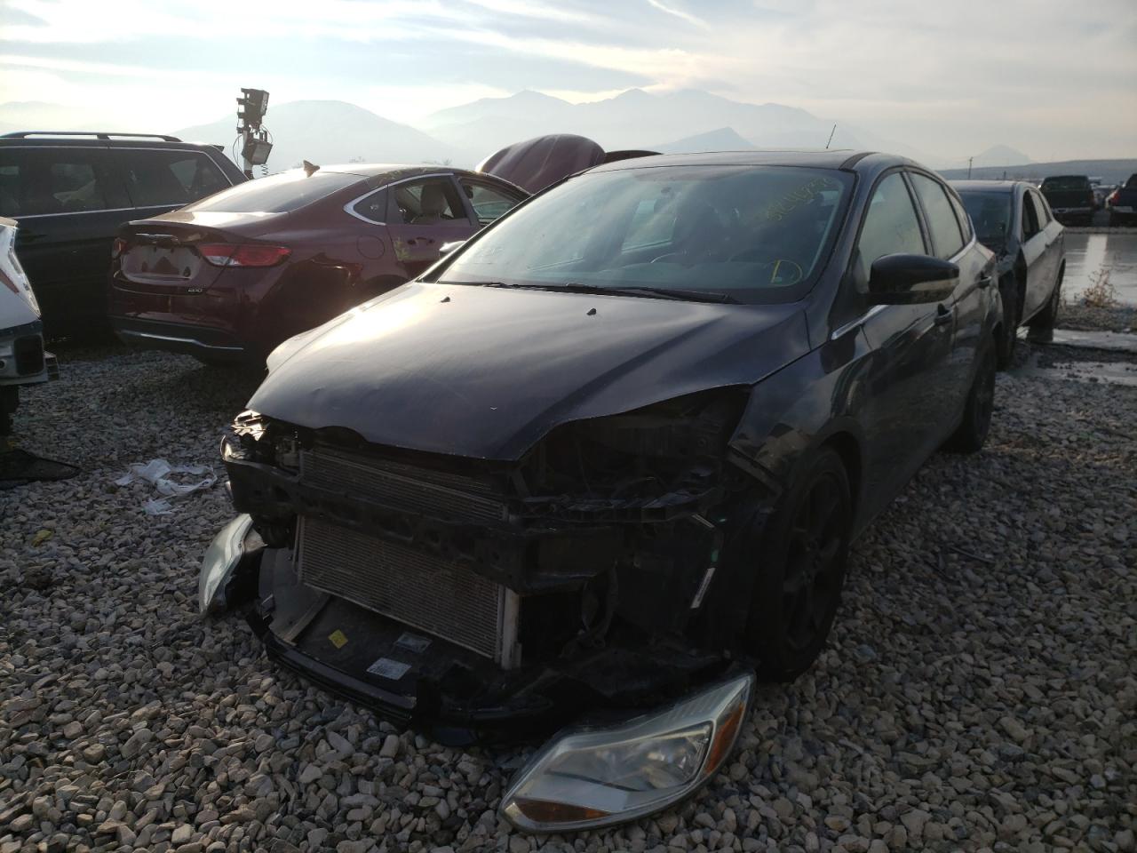 Photo 2 from auction – 2013 FORD FOCUS TITA with VIN 1FADP3N28DL152014