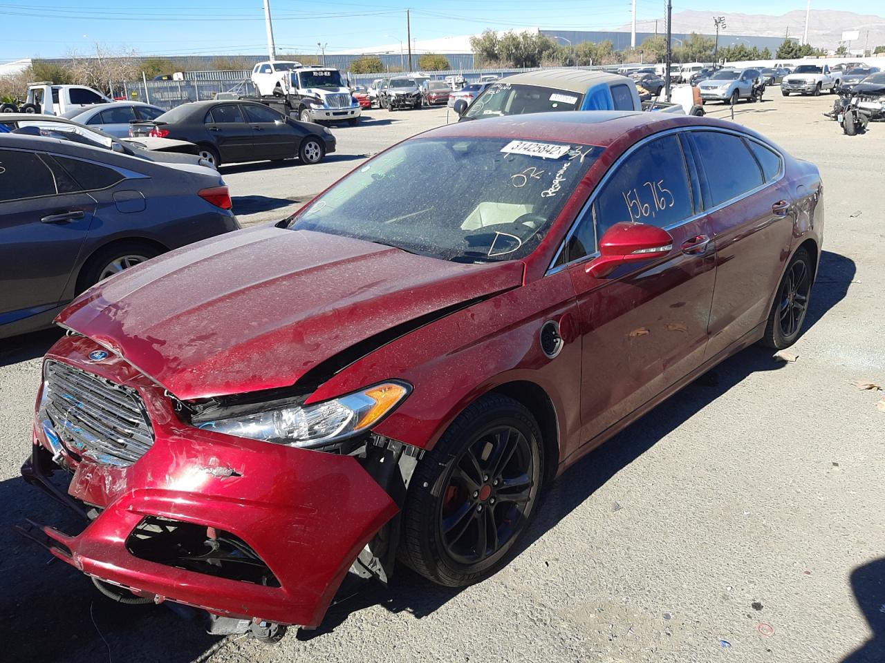 Photo 2 from auction – 2016 FORD FUSION TIT with VIN 3FA6P0SUXGR129370