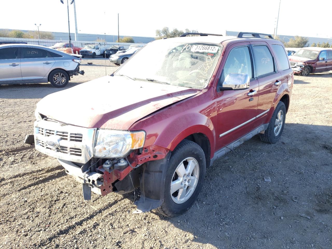 Photo 2 from auction – 2009 FORD ESCAPE with VIN 1FMCU93GX9KB93429