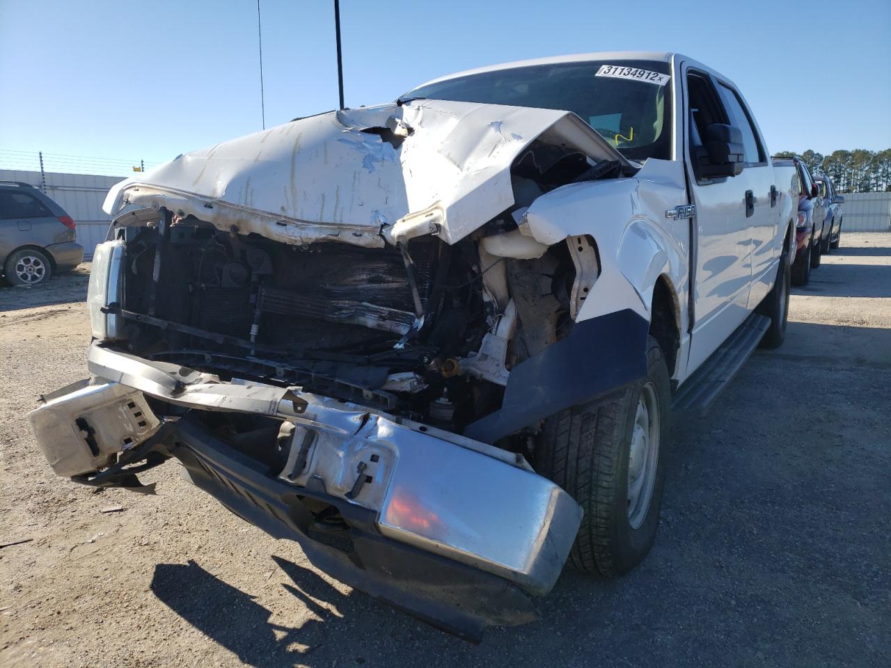 Photo 9 from auction – 2014 FORD F150 SUPER with VIN 1FTFW1EF2EKD69515