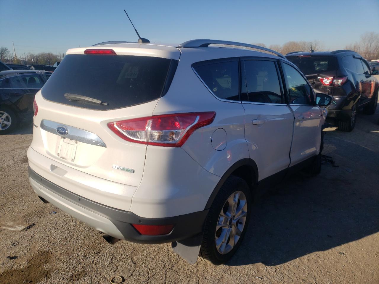 Photo 4 from auction – 2014 FORD ESCAPE TIT with VIN 1FMCU0J98EUD28762