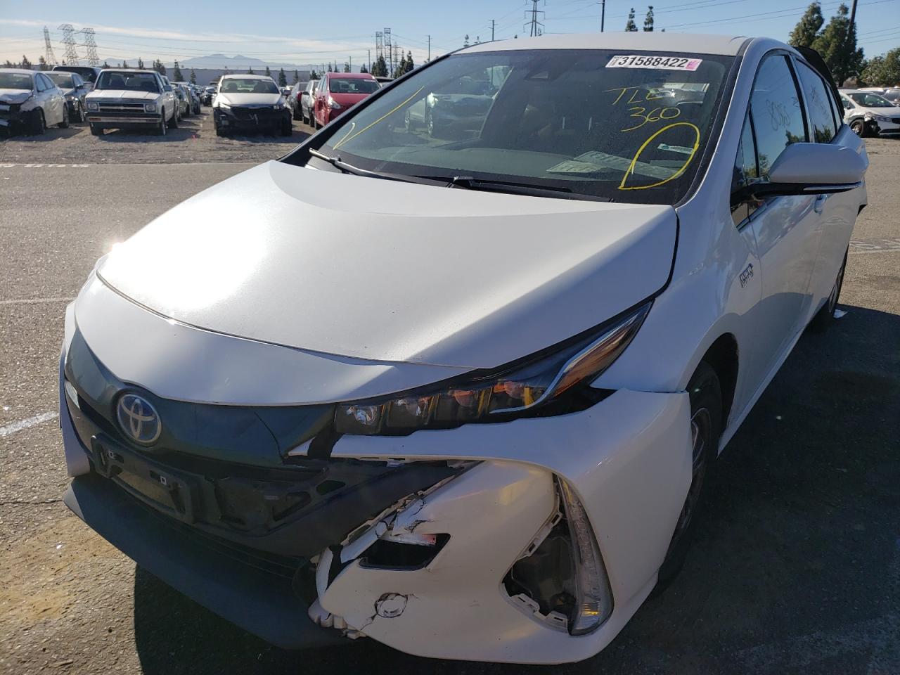 Photo 2 from auction – 2018 TOYOTA PRIUS PRIM with VIN JTDKARFP0J3099532