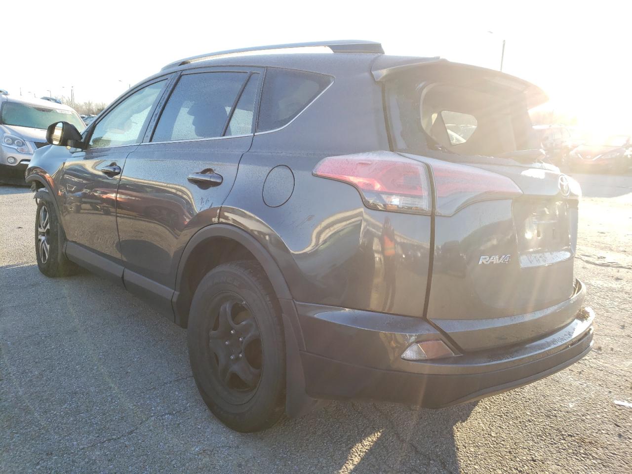 Photo 3 from auction – 2017 TOYOTA RAV4 LE with VIN JTMZFREV1HJ126291