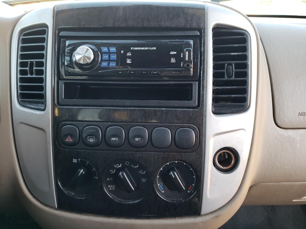 Photo 9 from auction – 2005 MERCURY MARINER with VIN 4M2YU56125DJ14919