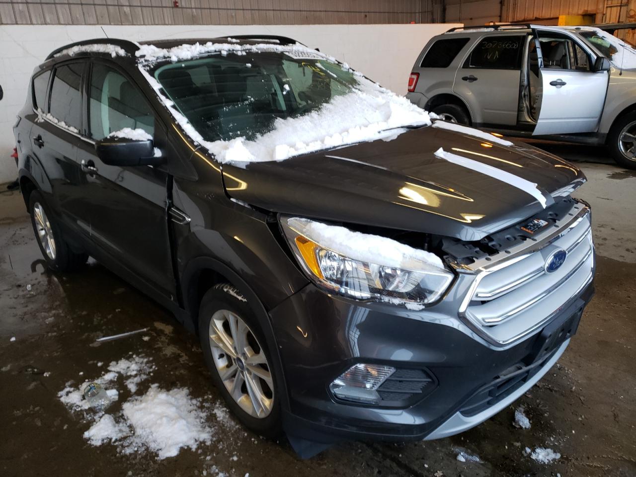 FORD ESCAPE SE 2018 with VIN 1FMCU9GD3JUB01232 - Photo from auction