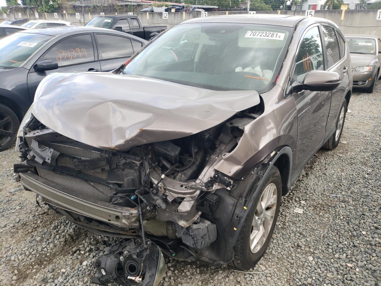Photo 2 from auction – 2015 HONDA CR-V TOURI with VIN 5J6RM3H97FL020487