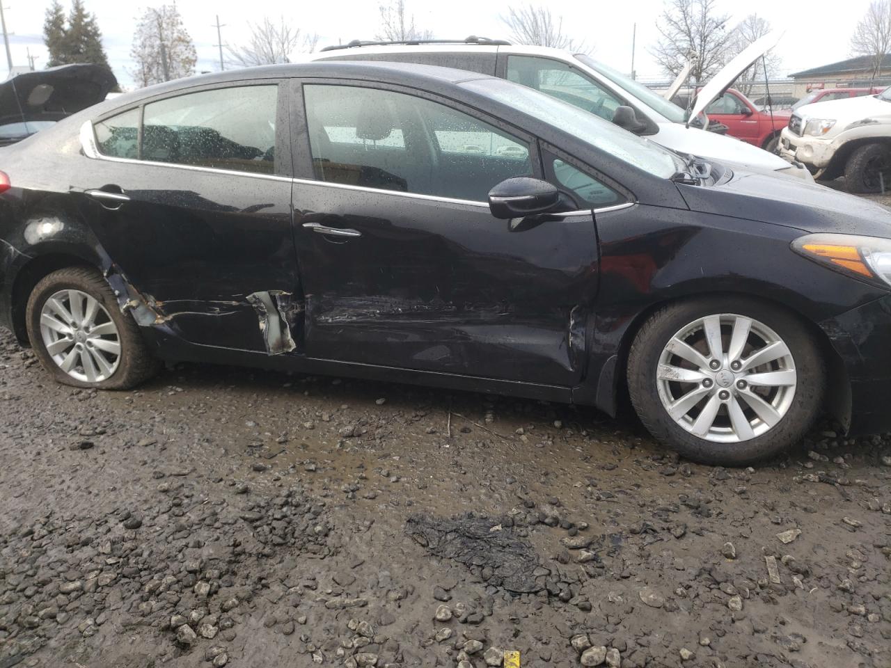 Photo 9 from auction – 2014 KIA FORTE EX with VIN KNAFX4A88E5205512