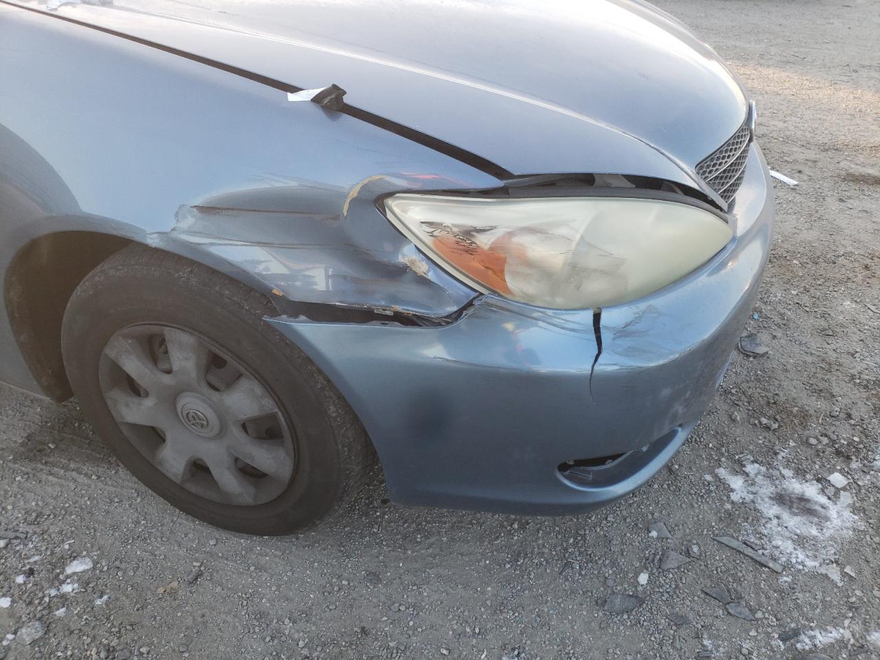 Photo 9 from auction – 2004 TOYOTA CAMRY LE with VIN JTDBE32K640259172