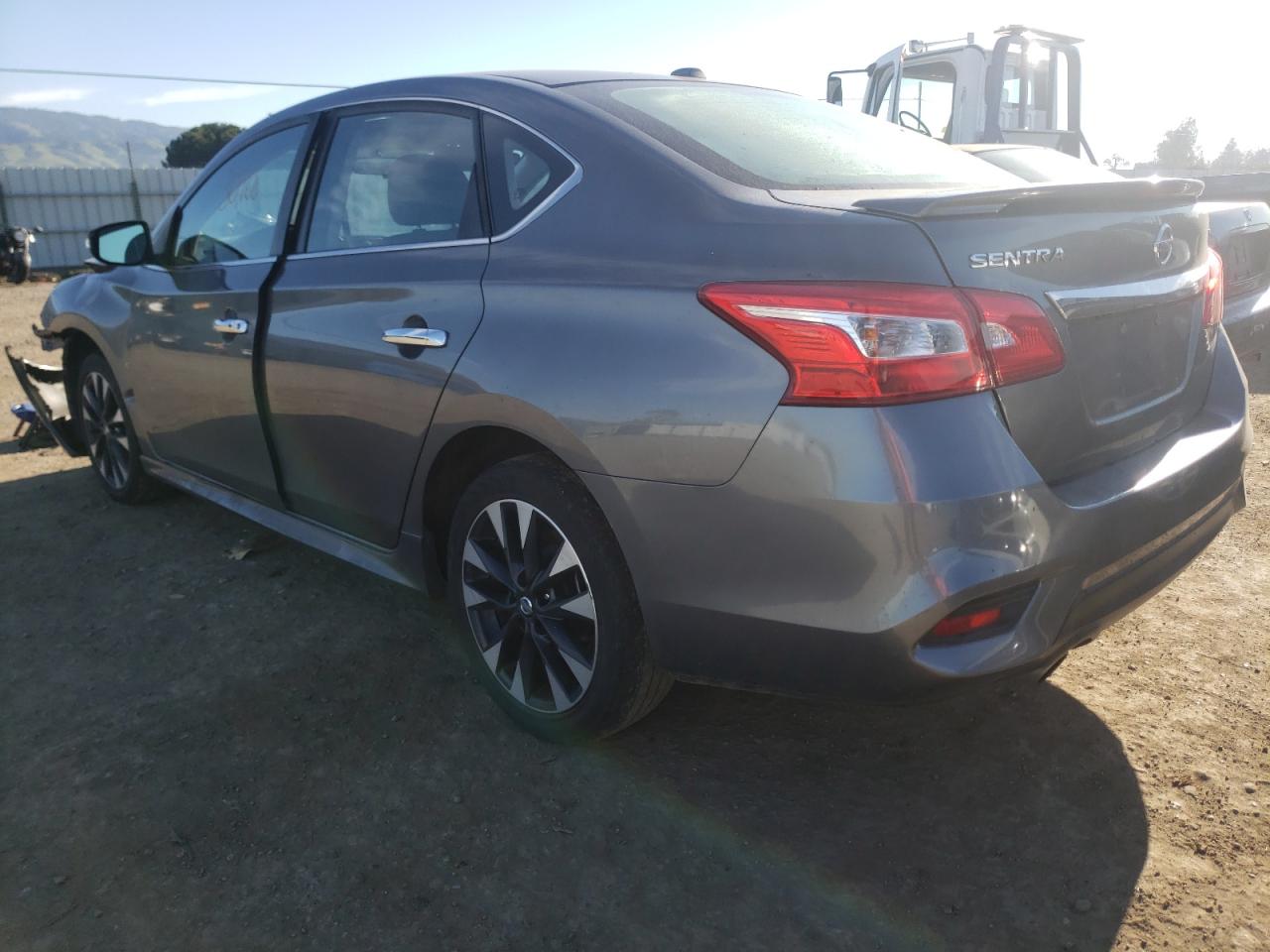 Photo 3 from auction – 2016 NISSAN SENTRA S with VIN 3N1AB7AP2GY315906