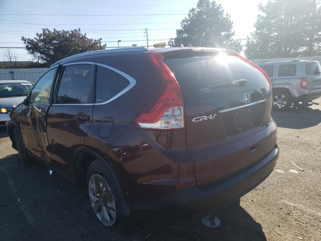 Photo 3 from auction – 2012 HONDA CR-V EXL with VIN 5J6RM3H77CL003604