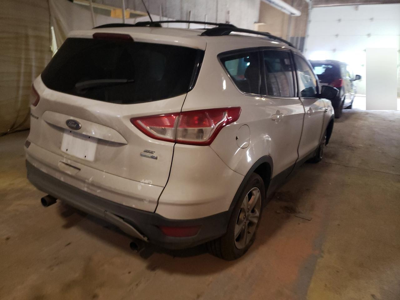 Photo 4 from auction – 2013 FORD ESCAPE SE with VIN 1FMCU9G93DUC63412
