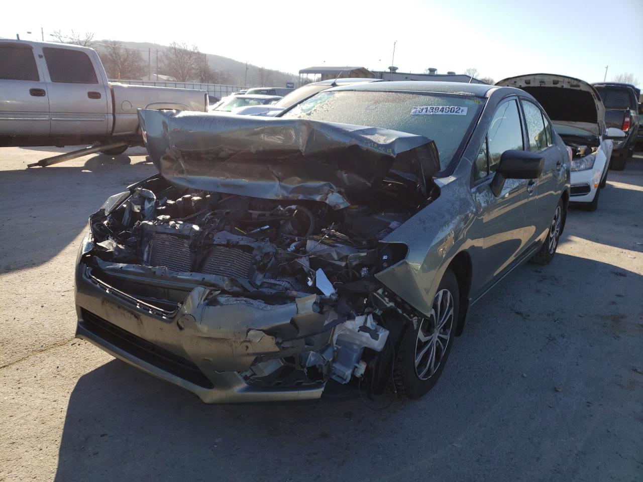 Photo 2 from auction – 2016 SUBARU IMPREZA with VIN JF1GJAA67GH015956