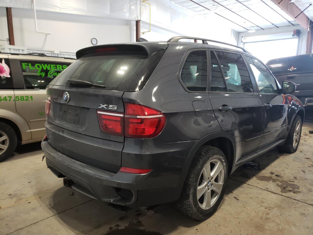 Photo 4 from auction – 2011 BMW X5 XDRIVE3 with VIN 5UXZW0C54BL657963