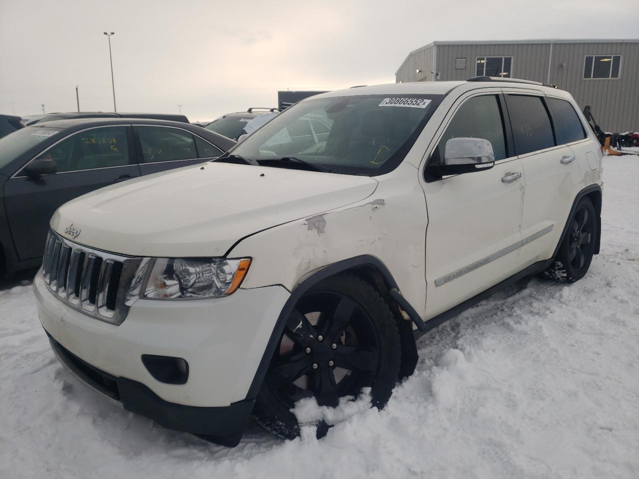 Photo 2 from auction – 2011 JEEP GRAND CHER with VIN 1J4RR6GT5BC536194
