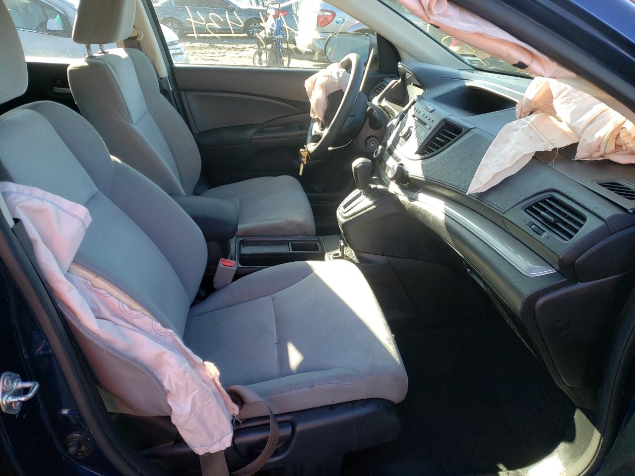 Photo 5 from auction – 2015 HONDA CR-V LX with VIN 2HKRM3H33FH536772