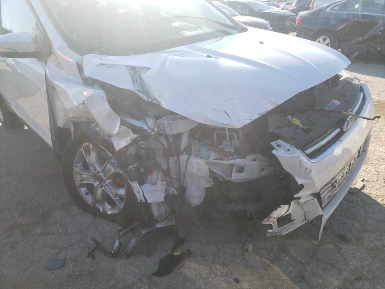 Photo 9 from auction – 2014 FORD ESCAPE TIT with VIN 1FMCU0J98EUD28762